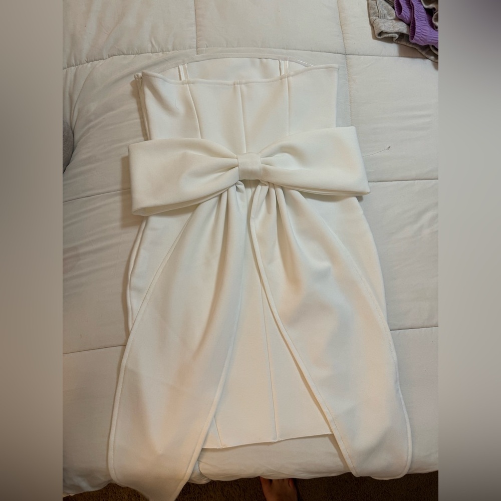 Strapless White rehearsal dress with bow and arm cuffs